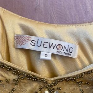 Evening dress gold with beading lined